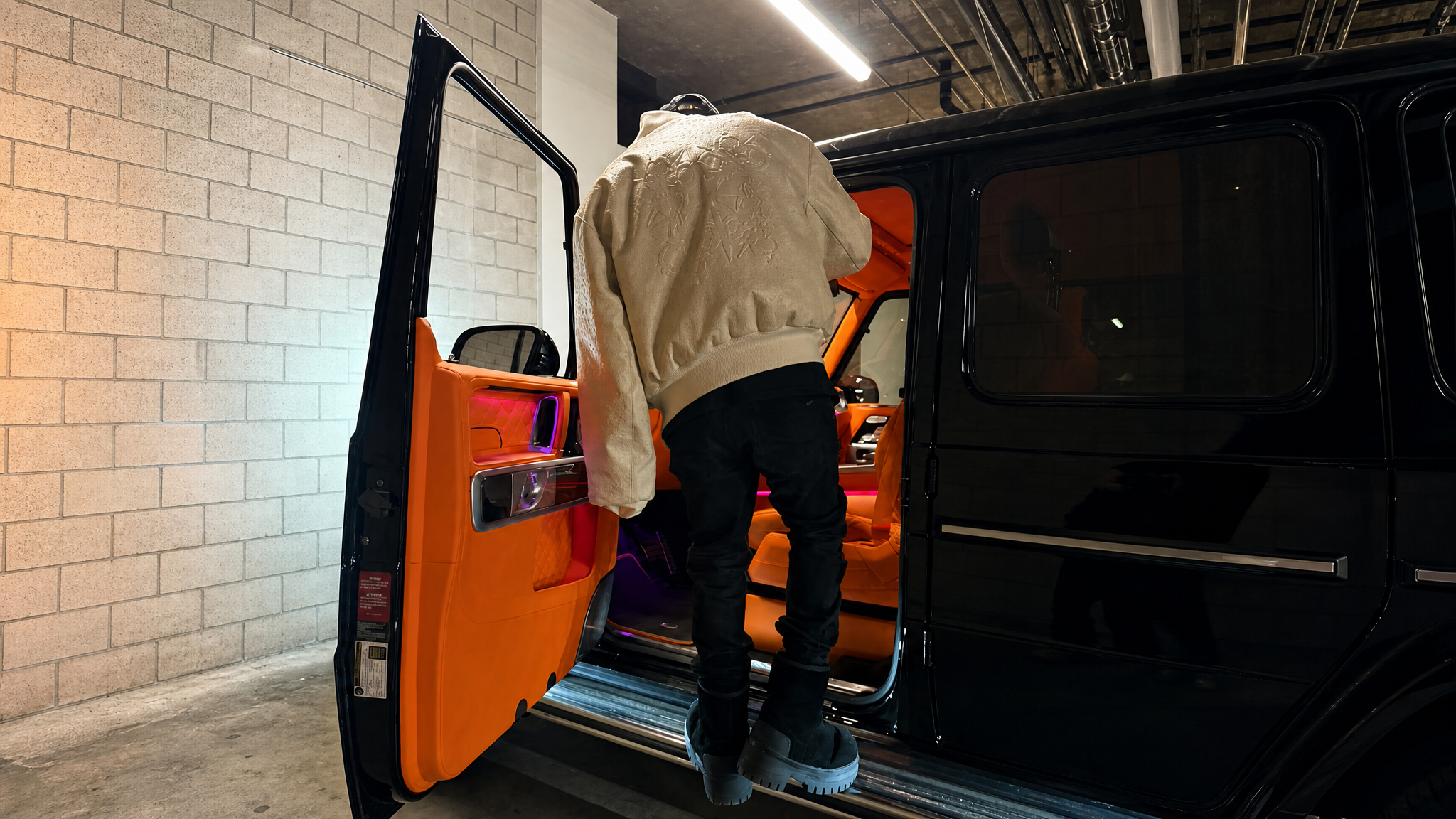 Frankie Quiroz, custom orange-leather G-Wagen interior