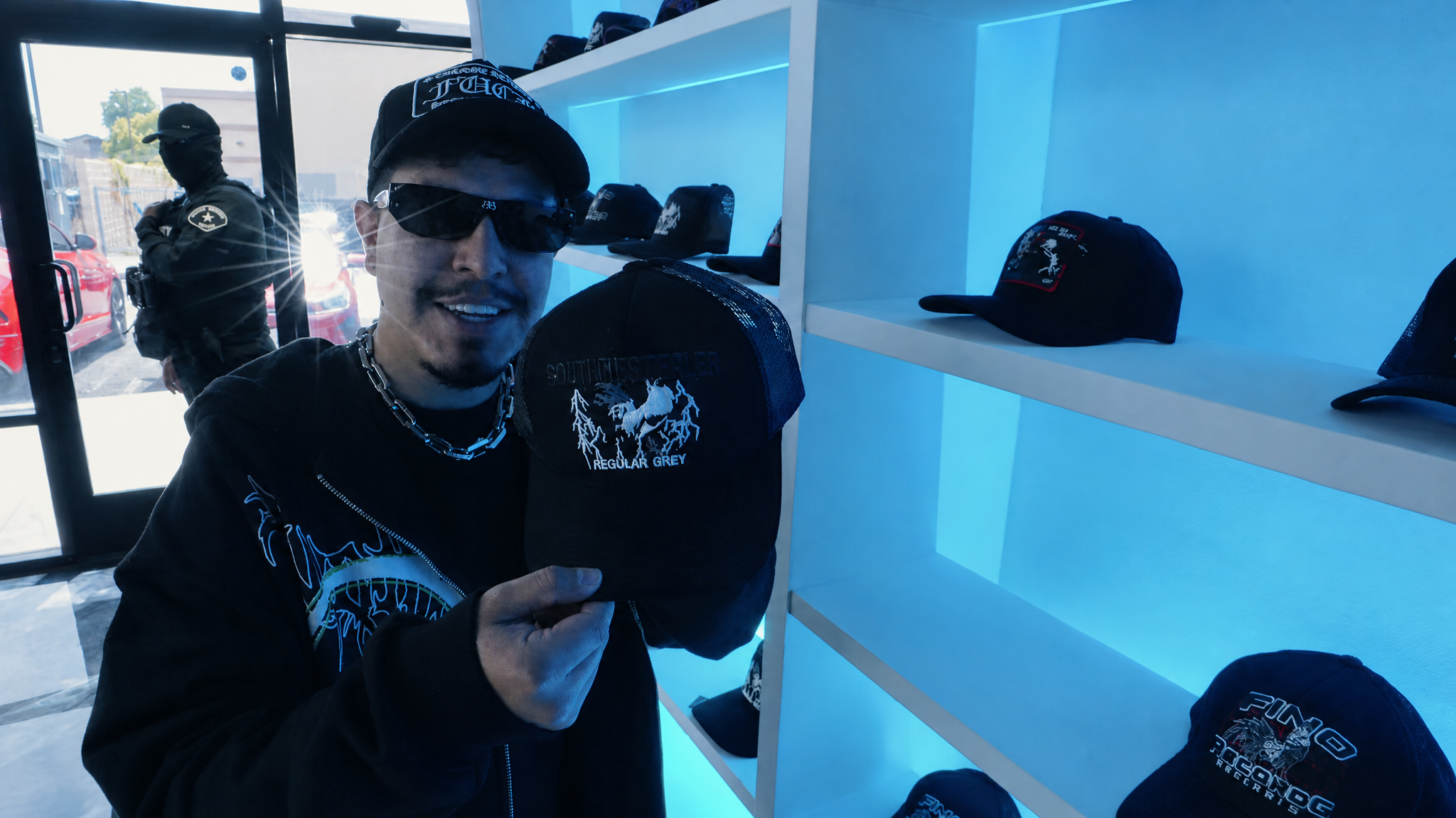 Frankie Quiroz inspecting a hat in the Gallo Fino showroom